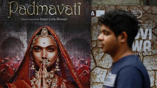 A man walks past a poster of the movie 'Padmavati', now renamed 'Padmaavat' outside a theatre in Mumbai on November 21, 2017. The Supreme Court has stayed a ban on the film imposed by Gujarat, Rajasthan, Haryana and Madhya Pradesh despite being cleared by the Central Board of Film Certification (CBFC), ensuring an all India release of the Sanjay Leela Bhansali film on January 25. (Danish Siddiqui / REUTERS File) A man walks past a poster of the movie 'Padmavati', now renamed 'Padmaavat' outside a theatre in Mumbai on November 21, 2017. The Supreme Court has stayed a ban on the film imposed by Gujarat, Rajasthan, Haryana and Madhya Pradesh despite being cleared by the Central Board of Film Certification (CBFC), ensuring an all India release of the Sanjay Leela Bhansali film on January 25. (Danish Siddiqui / REUTERS File)