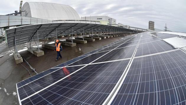 A photo shows photovoltaic panels on a one-megawatt power plant. India, which receives twice as much sunshine as European nations, wants to make solar central to its renewable expansion.(AFP/Representative)