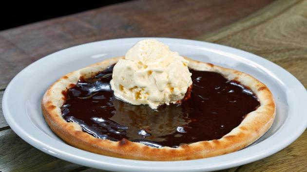 Under pressure and gobbling pizza or chocolate? It may not be your fault, according to Japanese researchers who have isolated the neurons that drive a craving for carbs. (Shutterstock) Under pressure and gobbling pizza or chocolate? It may not be your fault, according to Japanese researchers who have isolated the neurons that drive a craving for carbs. (Shutterstock)