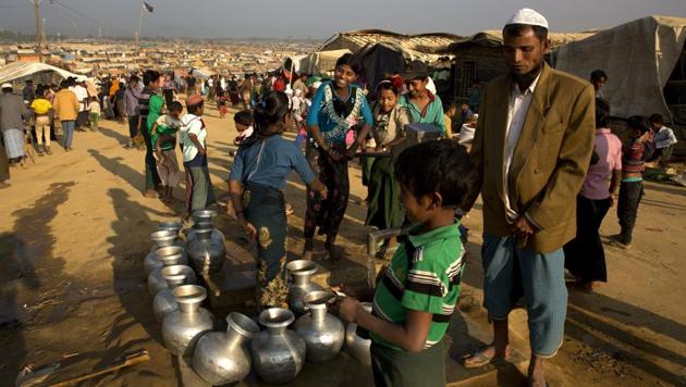 Rohingya refugee children fill drinking water from a hand pump at Balukhali refugee camp, 50 kilometres (32 miles) from, Cox's Bazar, Bangladesh, Thursday, Jan. 18, 2018. (AP Photo) Rohingya refugee children fill drinking water from a hand pump at Balukhali refugee camp, 50 kilometres (32 miles) from, Cox's Bazar, Bangladesh, Thursday, Jan. 18, 2018. (AP Photo)