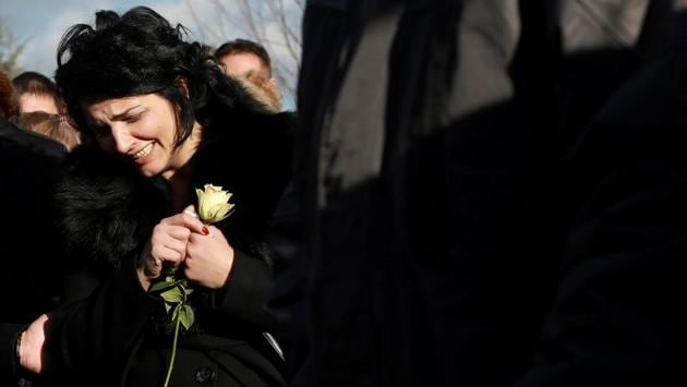 Milena Popovic Ivanovic, wife of Serbian politician Oliver Ivanovic at his funeral, after he was assassinated in front of the party office in Belgrade on January 18. (Djordje Kojadinovic / REUTERS) Milena Popovic Ivanovic, wife of Serbian politician Oliver Ivanovic at his funeral, after he was assassinated in front of the party office in Belgrade on January 18. (Djordje Kojadinovic / REUTERS)