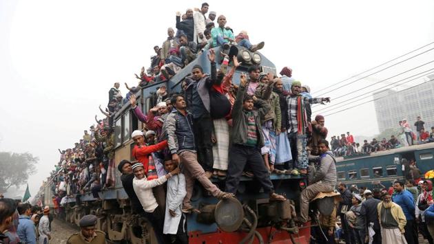An overcrowded train leaves Tongi rail station after the final prayer of the first phase of this year’s “Bishwa Ijtema”, an annual theological congregation of Muslims on the banks of the Turag river in Bangladesh on January 14. (Mohammad Ponir Hossain / REUTERS) An overcrowded train leaves Tongi rail station after the final prayer of the first phase of this year’s “Bishwa Ijtema”, an annual theological congregation of Muslims on the banks of the Turag river in Bangladesh on January 14. (Mohammad Ponir Hossain / REUTERS)