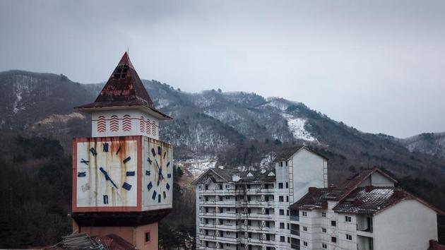 But like springtime snow, the villagers’ expectations for the resort are steadily melting away. “I don’t think it will ever reopen,” said Koo. It’s that one percent of hope. That’s the only thing I’m holding on to,” he added. Immediately a silence takes over, a rusty clock tower looms over the disused resort, its hands permanently pointing to 6:50 in the bright midday light while three guard dogs wait to bark furiously at the sight of a rare visitor. (Ed Jones / AFP) But like springtime snow, the villagers’ expectations for the resort are steadily melting away. “I don’t think it will ever reopen,” said Koo. It’s that one percent of hope. That’s the only thing I’m holding on to,” he added. Immediately a silence takes over, a rusty clock tower looms over the disused resort, its hands permanently pointing to 6:50 in the bright midday light while three guard dogs wait to bark furiously at the sight of a rare visitor. (Ed Jones / AFP)