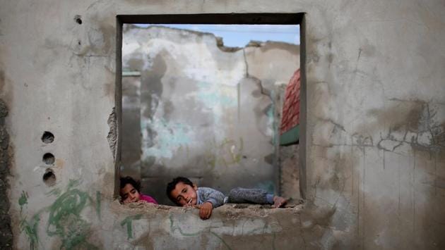Palestinian children play in their house at the Al-Shati refugee camp in Gaza City on January 15. (Mohammed Salem / REUTERS) Palestinian children play in their house at the Al-Shati refugee camp in Gaza City on January 15. (Mohammed Salem / REUTERS)