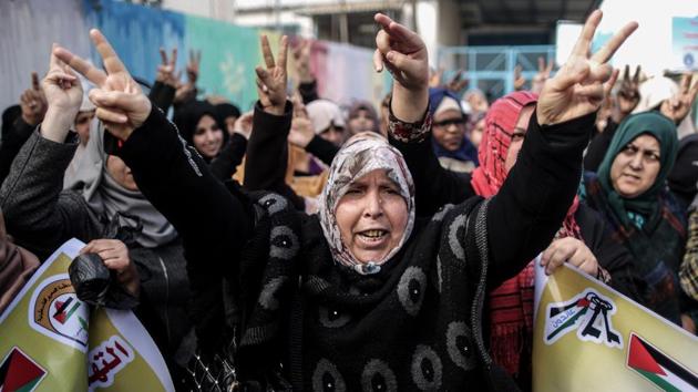 Palestinian women protest outside of the United Nations' offices in al-Nusirat refugee camp in the Gaza strip on January 17, 2018 after the White House froze tens of millions of dollars in contributions. (AFP) Palestinian women protest outside of the United Nations' offices in al-Nusirat refugee camp in the Gaza strip on January 17, 2018 after the White House froze tens of millions of dollars in contributions. (AFP)