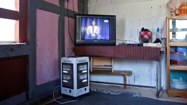 An electric heater and television sit in the corner of a traditional farmhouse in Punakha. Bhutan was one of the last countries usher in television and the internet. In 1999, the then Bhutanese king Jigme Singye Wangchuck said that television was a critical step towards modernization but also warned that its misuse could erode traditional values in the valley nation. (Cathal McNaughton / REUTERS) An electric heater and television sit in the corner of a traditional farmhouse in Punakha. Bhutan was one of the last countries usher in television and the internet. In 1999, the then Bhutanese king Jigme Singye Wangchuck said that television was a critical step towards modernization but also warned that its misuse could erode traditional values in the valley nation. (Cathal McNaughton / REUTERS)