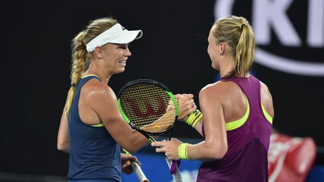 Denmark's Caroline Wozniacki (L) shakes hands with Netherland's Kiki Bertens after their women's singles third round match. The former won 6-4, 6-3. (AFP) Denmark's Caroline Wozniacki (L) shakes hands with Netherland's Kiki Bertens after their women's singles third round match. The former won 6-4, 6-3. (AFP)