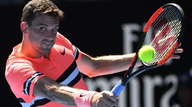 Bulgaria's Grigor Dimitrov hits a return against Russia's Andrey Rublev during their Australian Open tennis encounter. (AFP) Bulgaria's Grigor Dimitrov hits a return against Russia's Andrey Rublev during their Australian Open tennis encounter. (AFP)