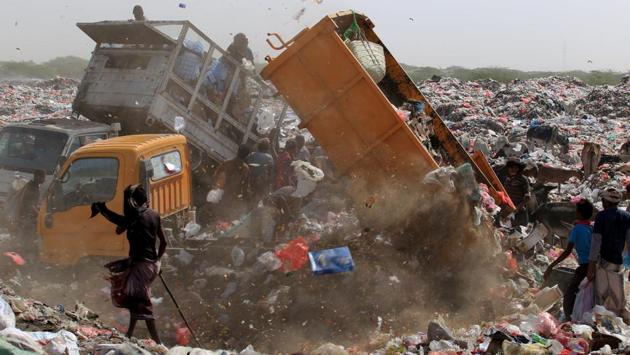 A group of scavengers gathers around a truck offloading trash in Hodeidah. Despite health risks, the city’s dump has become a source of food for hundreds of impoverished Yemenis and given some young men a chance to try to earn some income. (Abduljabbar Zeyad / REUTERS) A group of scavengers gathers around a truck offloading trash in Hodeidah. Despite health risks, the city’s dump has become a source of food for hundreds of impoverished Yemenis and given some young men a chance to try to earn some income. (Abduljabbar Zeyad / REUTERS)