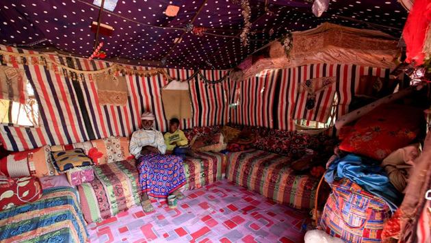 The family patriarch Mohammed Ruzaiq (L), 67, and his son Ayoub sit in the tent they share with other members of the family. "All we want is for them to stop this war and this calamity and God almighty will provide for us," Mohammed Ruzaiq said. (Abduljabbar Zeyad / REUTERS) The family patriarch Mohammed Ruzaiq (L), 67, and his son Ayoub sit in the tent they share with other members of the family. "All we want is for them to stop this war and this calamity and God almighty will provide for us," Mohammed Ruzaiq said. (Abduljabbar Zeyad / REUTERS)