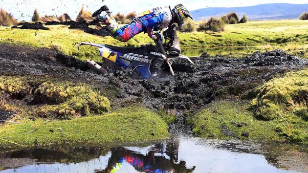 Argentinian biker Franco Caimi is thrown off his bike during a crash into heavy mud during Stage 7 between La Paz and Uyuni, Bolivia. (Franck Fife / AFP) 