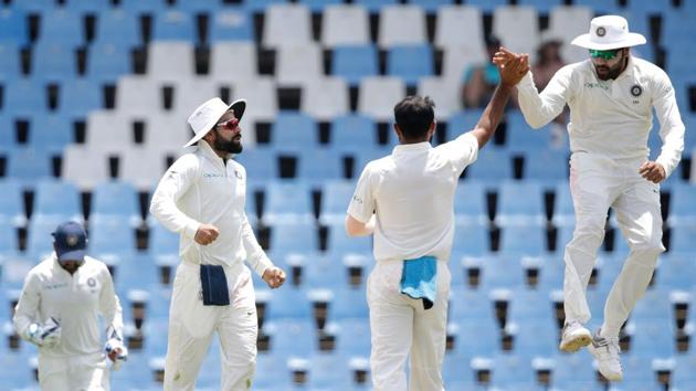 Indian bowler Mohammed Shami (back to lens) celebrates the dismissal of South African batsman Quinton de Kock (not pictured) during the fourth day of the second Test cricket match between South Africa and India at Supersport cricket ground on January 16. (Gianluigi Guercia / AFP) Indian bowler Mohammed Shami (back to lens) celebrates the dismissal of South African batsman Quinton de Kock (not pictured) during the fourth day of the second Test cricket match between South Africa and India at Supersport cricket ground on January 16. (Gianluigi Guercia / AFP)