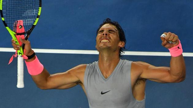 Rafael Nadal celebrates after victory over Damir Dzumhur in a third round match of the Australian Open in Melbourne on Friday. (AFP)