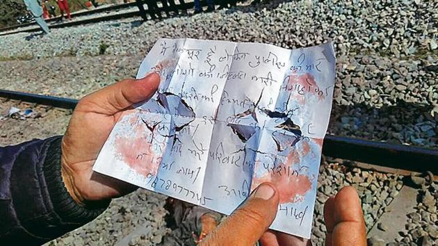 The torn and blood-stained suicide note recovered along with the body of Avinash Yadav from the tracks near Gazipur in Zirakpur on Friday. (HT Photo) The torn and blood-stained suicide note recovered along with the body of Avinash Yadav from the tracks near Gazipur in Zirakpur on Friday. (HT Photo)