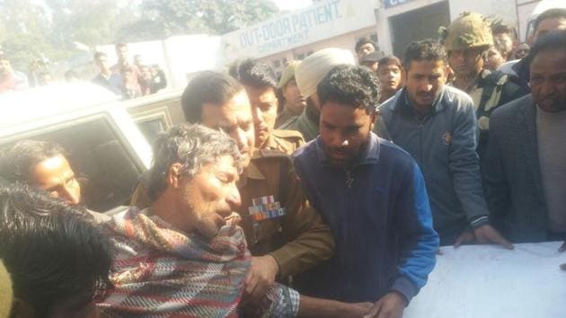 A civilian injured in Pakistani shelling in RS Pura sector of Jammu district being taken to a hospital on Saturday. (HT PHOTO) A civilian injured in Pakistani shelling in RS Pura sector of Jammu district being taken to a hospital on Saturday. (HT PHOTO)