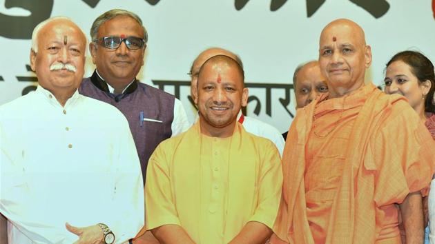 Uttar Pradesh Chief Minister Yogi Adityanath and RSS chief Mohan Bhagwat at the annual Bharatatma Ashokji Singhal Vedic Awards 2017 function in New Delhi.(PTI File Photo)