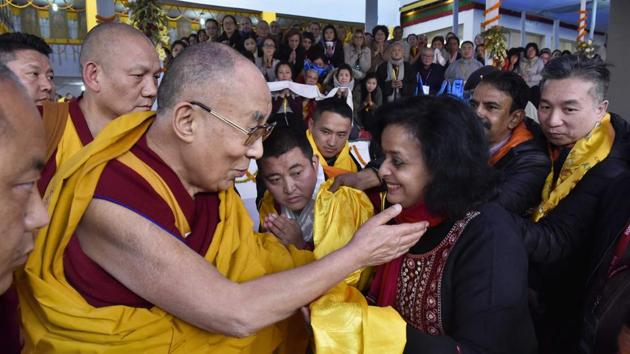 Tibetan spiritual leader Dalai Lama greets his followers at an event in Kalchakra Maidan, in Bodh Gaya on Friday. (PTI Photo) Tibetan spiritual leader Dalai Lama greets his followers at an event in Kalchakra Maidan, in Bodh Gaya on Friday. (PTI Photo)