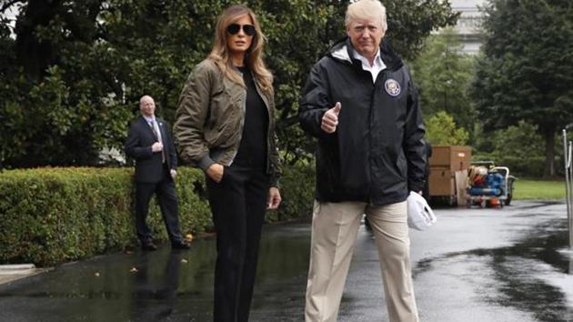 FILE - In this Aug. 29, 2017 file photo, President Donald Trump, accompanied by first lady Melania Trump, gives a thumbs-up as they walk to Marine One on the South Lawn of the White House in Washington. (AP) FILE - In this Aug. 29, 2017 file photo, President Donald Trump, accompanied by first lady Melania Trump, gives a thumbs-up as they walk to Marine One on the South Lawn of the White House in Washington. (AP)