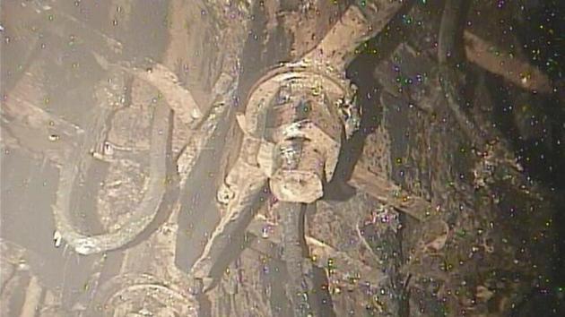 A photo taken by a robotic probe provided by the International Research Institute for Nuclear Decommissioning on January 19, 2018, shows a view of the bottom of a structure housing a safety system called the control rod drive, which appeared rusty and coated with unidentified material at the Fukushima nuclear plant. The operator of the crippled Fukushima nuclear plant says a long telescopic pipe carrying a camera has captured images of some melted fuel inside one of the three reactors, crucial information for the decades-long clean up. (AP) A photo taken by a robotic probe provided by the International Research Institute for Nuclear Decommissioning on January 19, 2018, shows a view of the bottom of a structure housing a safety system called the control rod drive, which appeared rusty and coated with unidentified material at the Fukushima nuclear plant. The operator of the crippled Fukushima nuclear plant says a long telescopic pipe carrying a camera has captured images of some melted fuel inside one of the three reactors, crucial information for the decades-long clean up. (AP)