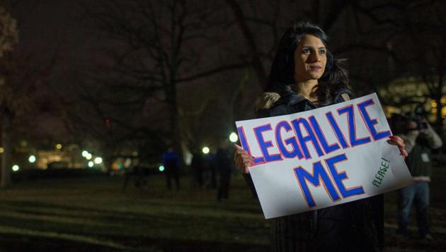 A supporter at a rally outside the US Capitol on January 19 in Washington, DC, ahead of the government shutdown. (AFP) A supporter at a rally outside the US Capitol on January 19 in Washington, DC, ahead of the government shutdown. (AFP)