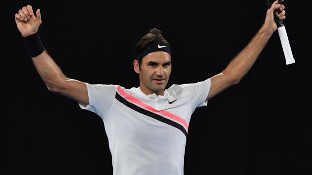 Roger Federer celebrates after victory in his Australian Open third round match against Richard Gasquet. (AFP)
