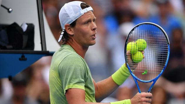 Czech Republic's Tomas Berdych disputes a call with the umpire after a point against Juan Martin del Potro. (AFP) 