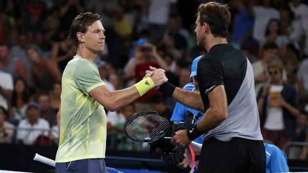 Czech Republic's Tomas Berdych shakes hands with Argentina's Juan Martin del Potro after winning their match at the Australian Open on Saturday. (Reuters) Czech Republic's Tomas Berdych shakes hands with Argentina's Juan Martin del Potro after winning their match at the Australian Open on Saturday. (Reuters)