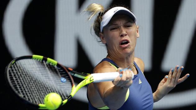 Caroline Wozniacki reached her first Australian Open tennis quarterfinal since 2012 with a 6-3, 6-0 win over Magdalena Rybarikova. (AP) Caroline Wozniacki reached her first Australian Open tennis quarterfinal since 2012 with a 6-3, 6-0 win over Magdalena Rybarikova. (AP)