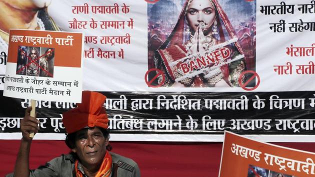 Member of a Hindu organization holds a placard demanding the ban on the Bollywood film "Padmaavat", in Mumbai, India, Saturday, Jan. 20, 2018.(AP File Photo)