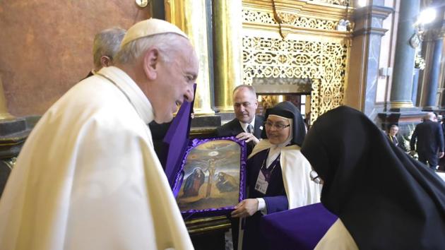 Pope Francis is greeted by nuns during a mid-morning prayer with contemplative nuns at the Shrine of Our Lord of the Miracles in Lima, Peru on Sunday. (AP) Pope Francis is greeted by nuns during a mid-morning prayer with contemplative nuns at the Shrine of Our Lord of the Miracles in Lima, Peru on Sunday. (AP)