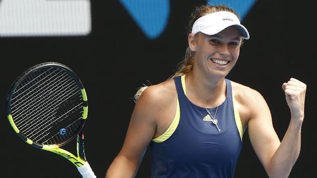 Caroline Wozniacki defeated Magdalena Rybarikova 6-3, 6-0 to advance to the quarterfinals of the Australian Open tennis tournament.(REUTERS)