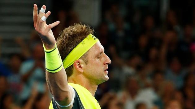 Tennys Sandgren celebrates after beating Dominic Thiem in the fourth round of the Australian Open at Melbourne Park on Monday. Sandgren will play Chung Hyeon in the quarterfinals.  (Getty Images) 