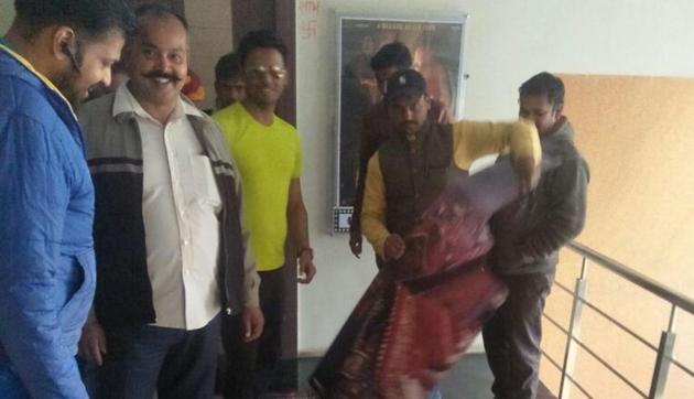 One for the camera. Rajput Karni Sena pose after tearing down posters of Padmaavat in a movie hall in Ranchi. (HT PHOTO) One for the camera. Rajput Karni Sena pose after tearing down posters of Padmaavat in a movie hall in Ranchi. (HT PHOTO)