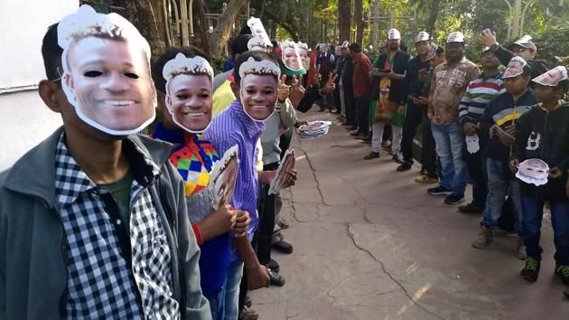 The face Mohun Bagan fans can’t forget. Fans sport Sony Norde masks at the club tent on Monday. (HT Photo) The face Mohun Bagan fans can’t forget. Fans sport Sony Norde masks at the club tent on Monday. (HT Photo)