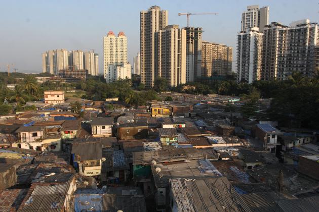 Slums side by side with high-rises in Thane, India, on November 8, 2017. (Praful Gangurde / HT Photo) Slums side by side with high-rises in Thane, India, on November 8, 2017. (Praful Gangurde / HT Photo)