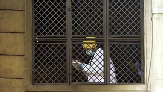 Forensic experts looking for evidence inside the Bawana building after a blaze killed 17, in New Delhi. (Arvind Yadav/HT Photo) Forensic experts looking for evidence inside the Bawana building after a blaze killed 17, in New Delhi. (Arvind Yadav/HT Photo)