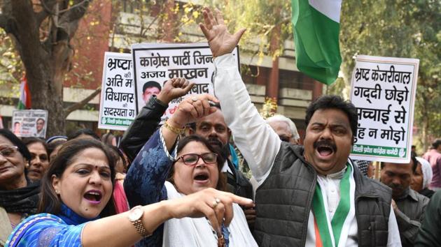 Congress workers demand the resignation of chief minister Arvind Kejriwal on corruption charges, in New Delhi on Monday. (Arvind Yadav/HT Photo) Congress workers demand the resignation of chief minister Arvind Kejriwal on corruption charges, in New Delhi on Monday. (Arvind Yadav/HT Photo)