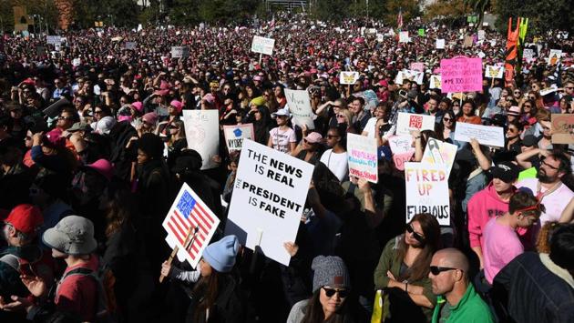 Protesters during a rally on the one-year anniversary of the Women's March in California. The weekend of demonstrations was aimed at translating enthusiasm into political action with the theme “Power to the Polls” -- a message designed to drive voter registrations and maximize women’s involvement in the 2018 midterm elections. (Mark Ralston / AFP) Protesters during a rally on the one-year anniversary of the Women's March in California. The weekend of demonstrations was aimed at translating enthusiasm into political action with the theme “Power to the Polls” -- a message designed to drive voter registrations and maximize women’s involvement in the 2018 midterm elections. (Mark Ralston / AFP)