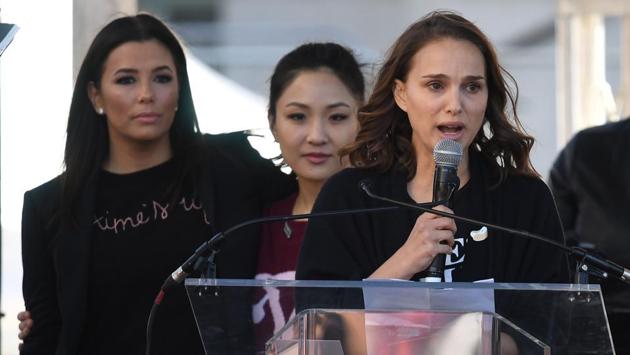 (L-R) Actors Eva Longoria, Constance Wu and Natalie Portman speak to the 500,000 strong crowd during the Women's Rally in Los Angeles, California. (Mark Ralston / AFP) (L-R) Actors Eva Longoria, Constance Wu and Natalie Portman speak to the 500,000 strong crowd during the Women's Rally in Los Angeles, California. (Mark Ralston / AFP)