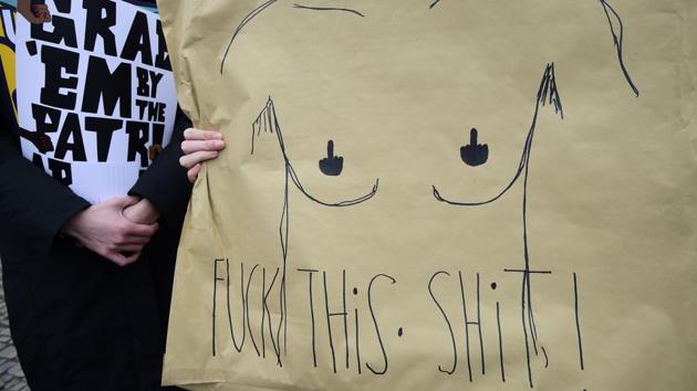Protesters demonstrate against the US president and his policies at Brandenburg Gate near the US embassy in Berlin. (Tobias Schwarz / AFP) Protesters demonstrate against the US president and his policies at Brandenburg Gate near the US embassy in Berlin. (Tobias Schwarz / AFP)