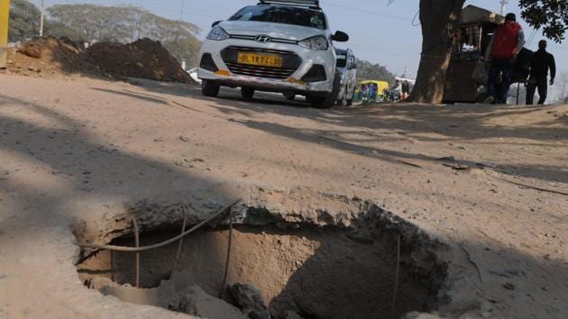A sewage manhole has been lying open for the last two months in Sector 34. It has led to many accidents. (Parveen Kumar/HT Photo) A sewage manhole has been lying open for the last two months in Sector 34. It has led to many accidents. (Parveen Kumar/HT Photo)