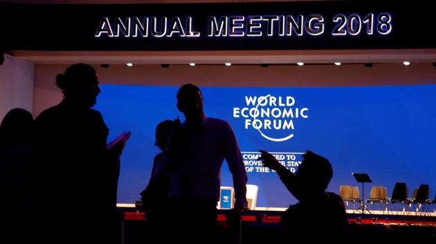 Staff talk in the Congress Hall ahead of the World Economic Forum (WEF) annual meeting in the Swiss Alps resort of Davos, Switzerland(REUTERS) Staff talk in the Congress Hall ahead of the World Economic Forum (WEF) annual meeting in the Swiss Alps resort of Davos, Switzerland(REUTERS)