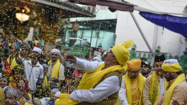 The dargah of Hazrat Nizamuddin Auliya is abuzz, and decked in yellow for Basant Panchami. Sufi Basant as it is popularly known, dates back to the 12th century when celebrated poet Amir Khusro dedicated songs of spring to his khwaja (spiritual master) Hazrat Nizamuddin Auliya. (Burhaan Kinu / HT Photo) The dargah of Hazrat Nizamuddin Auliya is abuzz, and decked in yellow for Basant Panchami. Sufi Basant as it is popularly known, dates back to the 12th century when celebrated poet Amir Khusro dedicated songs of spring to his khwaja (spiritual master) Hazrat Nizamuddin Auliya. (Burhaan Kinu / HT Photo)