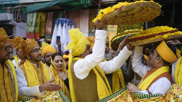 Khusrow is then said to have donned a yellow ghagra, covered his head with a yellow chunari , and burst into spring songs with a dholak around his neck for his master. Hazrat Nizamuddin broke into laughter at the sight and thus ended his mourning. (Burhaan Kinu / HT Photo) Khusrow is then said to have donned a yellow ghagra, covered his head with a yellow chunari , and burst into spring songs with a dholak around his neck for his master. Hazrat Nizamuddin broke into laughter at the sight and thus ended his mourning. (Burhaan Kinu / HT Photo)