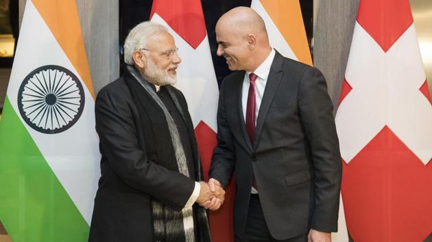 Prime Minister Narendra Modi and Swiss Federal President Alain Berset shake hands prior to a meeting one day before the start of the 48th annual meeting of the World Economic Forum in Davos, Switzerland. (AP Photo) Prime Minister Narendra Modi and Swiss Federal President Alain Berset shake hands prior to a meeting one day before the start of the 48th annual meeting of the World Economic Forum in Davos, Switzerland. (AP Photo)