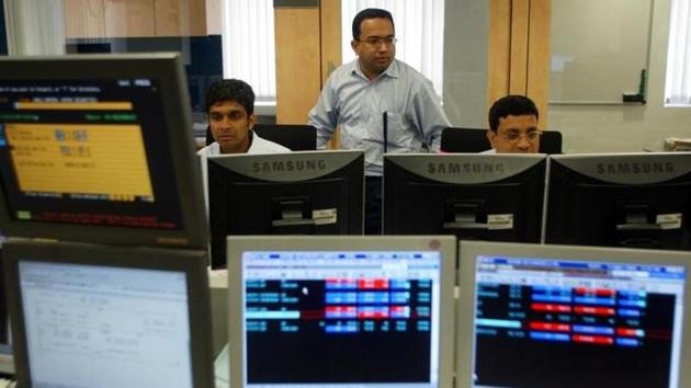 Stock brokers keep watch on the key Sensex share index graph in a brokerage firm in Mumbai. (Reuters) Stock brokers keep watch on the key Sensex share index graph in a brokerage firm in Mumbai. (Reuters)