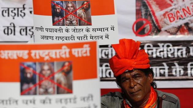A member of the Rajput community holds a placard during a protest against the release of 'Padmaavat' in Mumbai. The Supreme Court on Tuesday dismissed Rajasthan and Madhya Pradesh governments’ pleas to modify its earlier order lifting the ban on the film. (Danish Siddiqui / REUTERS File) A member of the Rajput community holds a placard during a protest against the release of 'Padmaavat' in Mumbai. The Supreme Court on Tuesday dismissed Rajasthan and Madhya Pradesh governments’ pleas to modify its earlier order lifting the ban on the film. (Danish Siddiqui / REUTERS File)