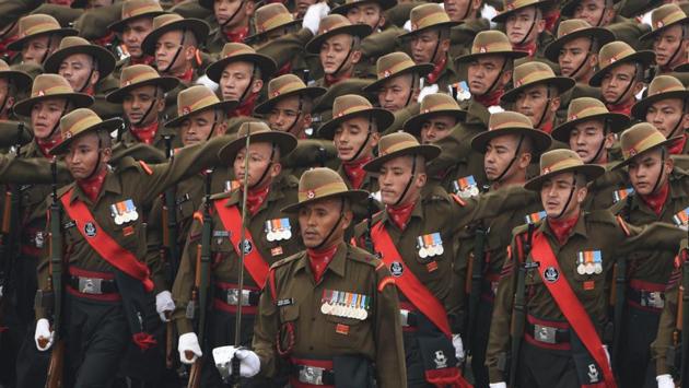 An Army contingent passes through the saluting base at Rajpath. Contingents representing all branches of the armed forces as well as paramilitary and police were seen. (Mohd Zakir / HT Photo) 