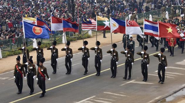 Army personnel bearing flags of ASEAN member nations during the rehearsal. Ten ASEAN heads of state will be in attendance as chief guests this year --a first in its own right --marking 25 years of India’s association with the collective.  (Mohd Zakir / HT Photo) 