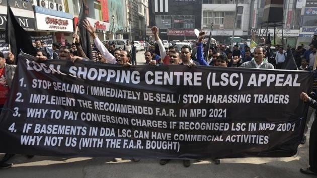 File photograph of shopkeepers staging a demonstration against the sealing drive in South Extension market in New Delhi on January 19. (HT PHOTO) File photograph of shopkeepers staging a demonstration against the sealing drive in South Extension market in New Delhi on January 19. (HT PHOTO)